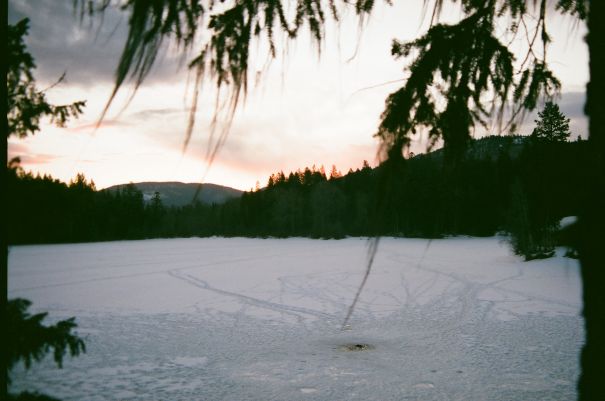 frozen lake bathed in twilight